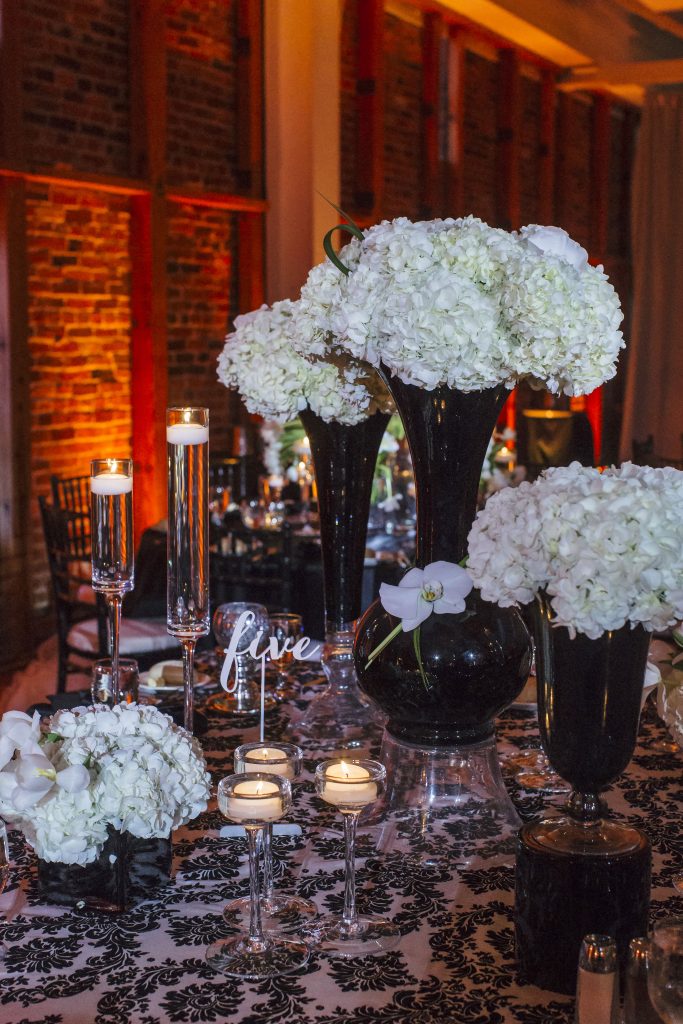 White Hydrangeas and Black Vases. Howerton+Wooten Events.
