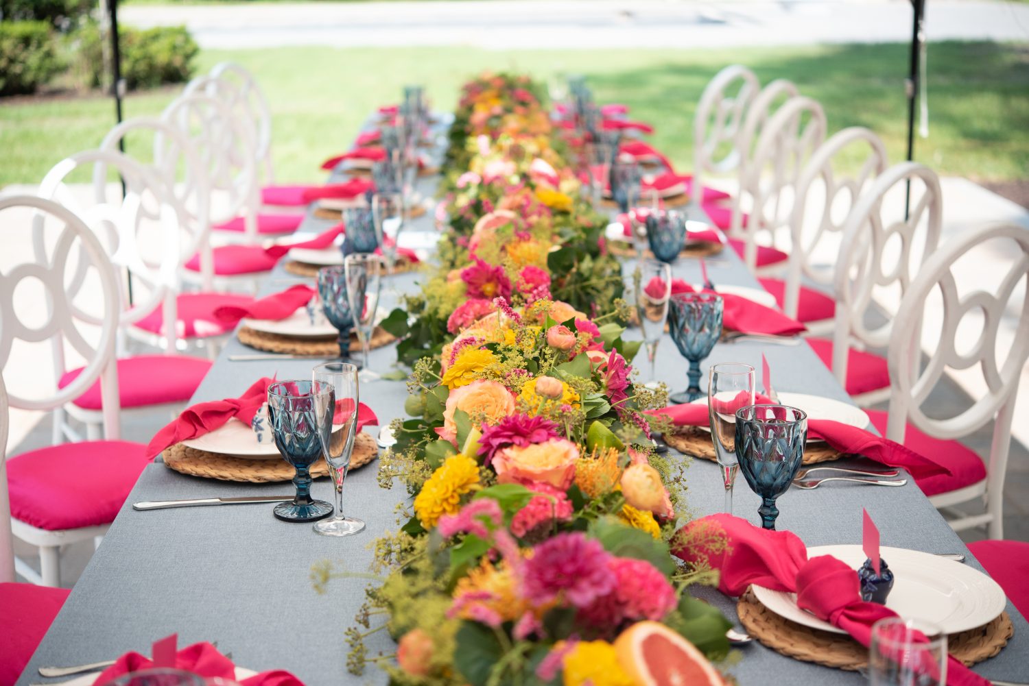Colorful Garland of Flowers and Citrus. Howerton+Wooten Events.