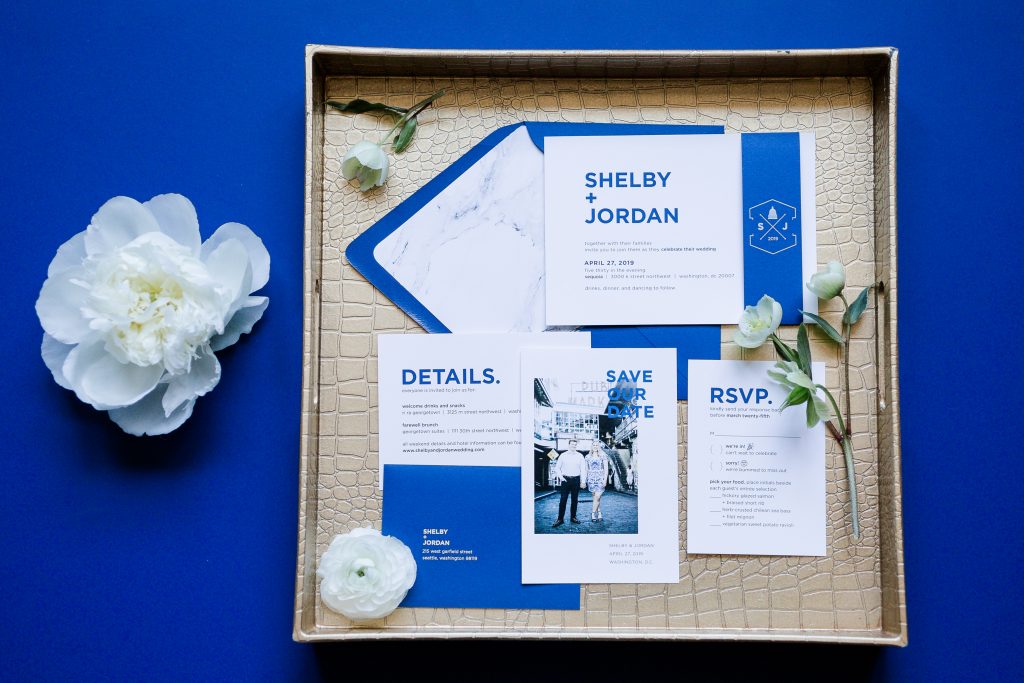 Blue and White Wedding Invitation on a Gold Tray. Howerton+Wooten Events.