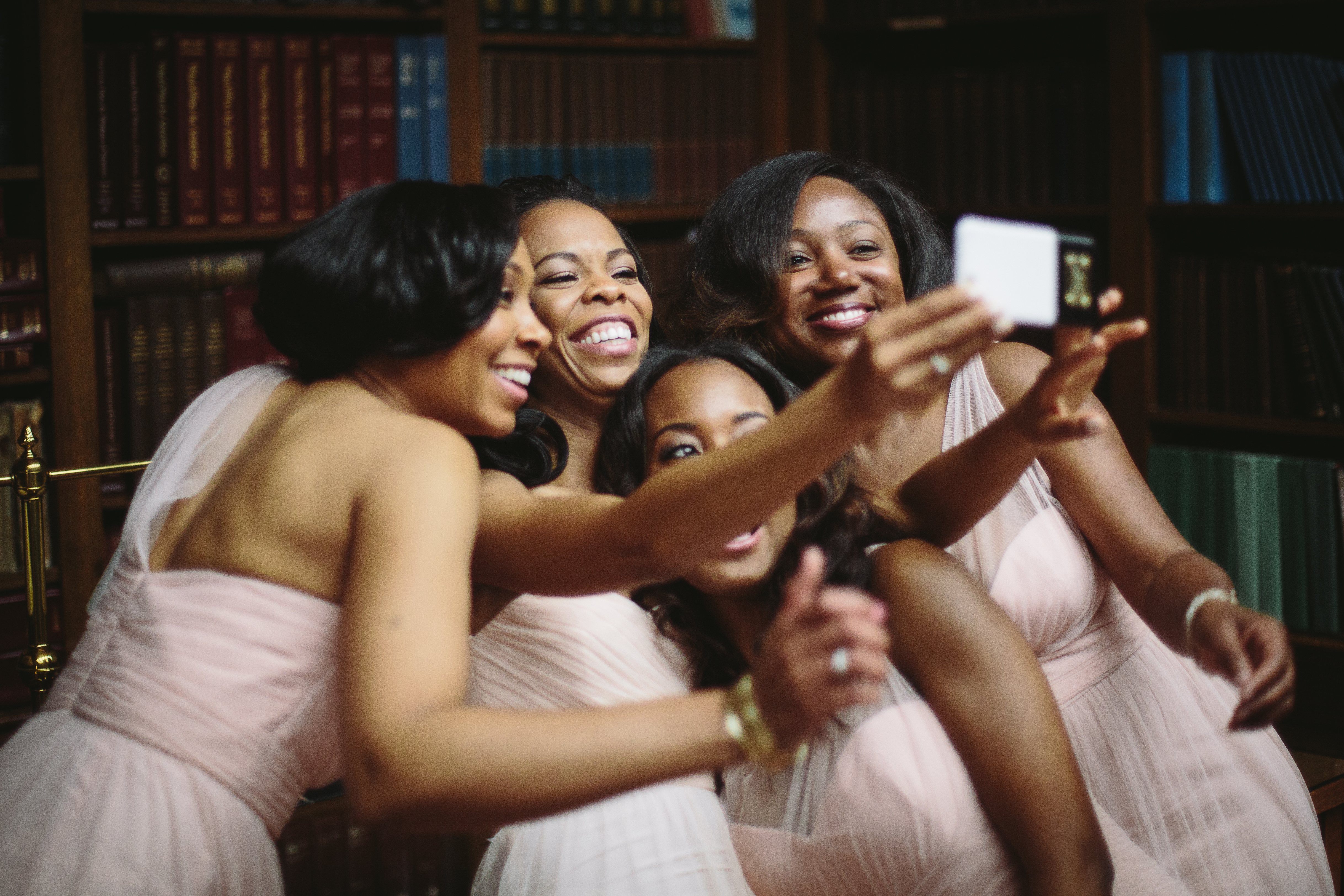 Bridesmaid in Blush Taking a Selfie. Howerton+Wooten Events.